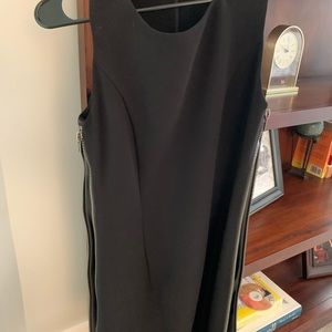Black BCBG dress with leather and zipper up sides, size 4